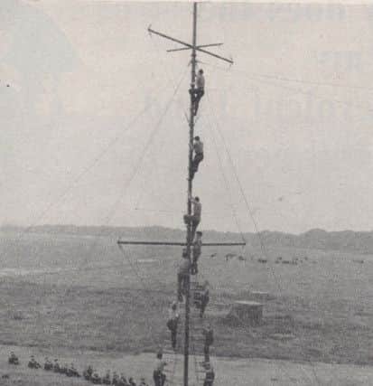 Junior ratings training for the mast-manning display at the Royal Tournament, Earls Court, 1964.