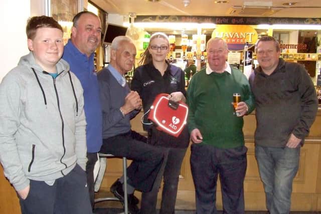 From left, Adam Sawyer, Dave Fisher, Len Ward, bar supervisor Emma Boothroyd, Mike Jarrett and Alan Sawyer