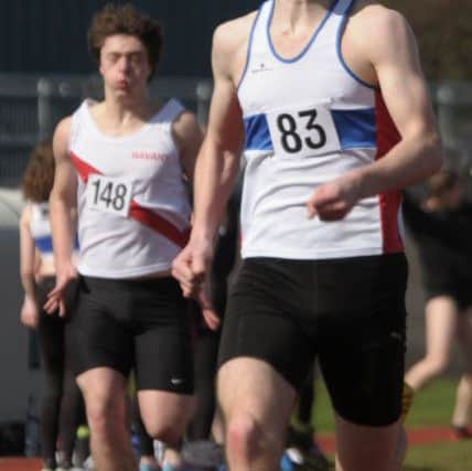 Harry Pocock wins the 200m. Picture: Mick Young (160475-02)