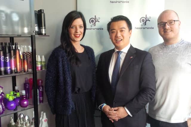Havant MP Alan Mak with Emily Warne and Pete Gibbs, the owners of Headromance hair salon