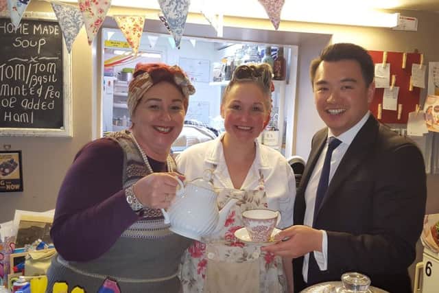 Havant MP Alan Mak at 19 Fourteas team room, Havant  with owner Jacqui Unal and staff