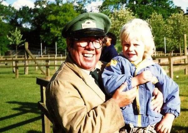 Ronnie Corbett with Sheila Booth-Millard's son Travis while he was filming Fierce Creatures at Marwell Zoo in 1995