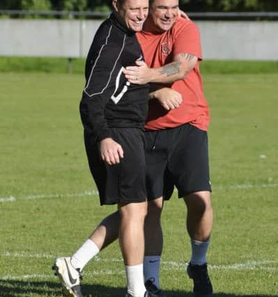 Petersfield Town manager Ian Saunders, right    Picture: Neil Marshall