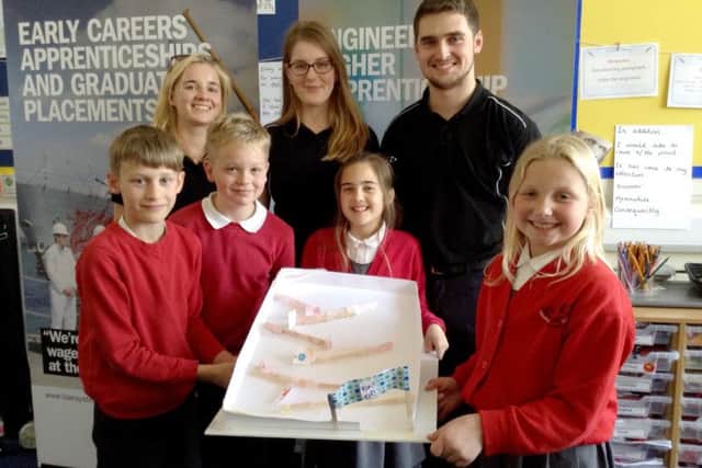 The winning team - Oliver Dixon, Oliver Twyman, Phoebe Hoyle and Summer Pretlove with the apprentices, from left, Olivia Ashman, Jordan Hinks and Dan Freeman