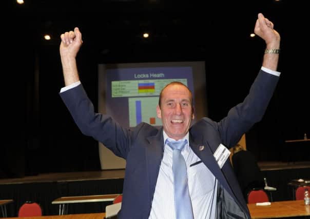 03/05/12 CB

Conservative party winning candidate, David Whittingham celebrates during the local election count for Fareham at Ferneham Hall.
Picture: Ian Hargreaves 4 ENGPPP00120120405025329