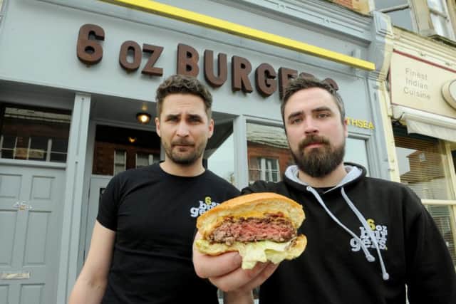 Piotr Mientkiewic, left, and James Baldry
at 6 oz Burgers in Southsea