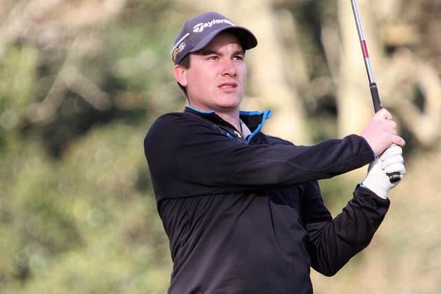 Rowlands Castle's Tom Robson hits his tee shot at the 10th hole in the second round of the 2016 Hampshire Hog, at North Hants GC, on Sunday April 17. He finished fourth on one-under par with rounds of 68, 71 Picture: Andrew Griffin