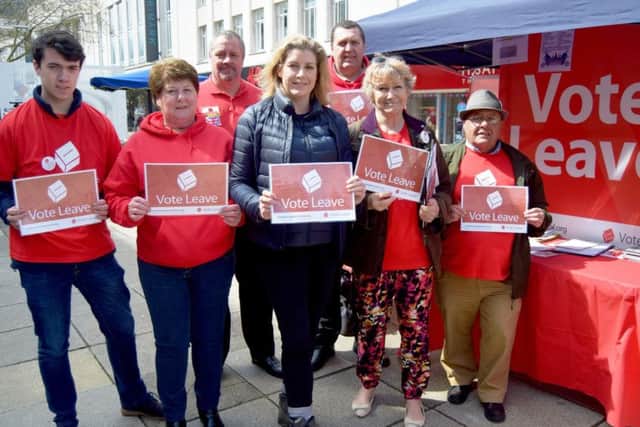 Portsmouth North MP Penny Mordaunt with campaigners from the city's Brexit group in Commercial Road