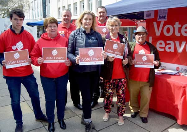 Portsmouth North MP Penny Mordaunt with campaigners from the city's Brexit group in Commercial Road