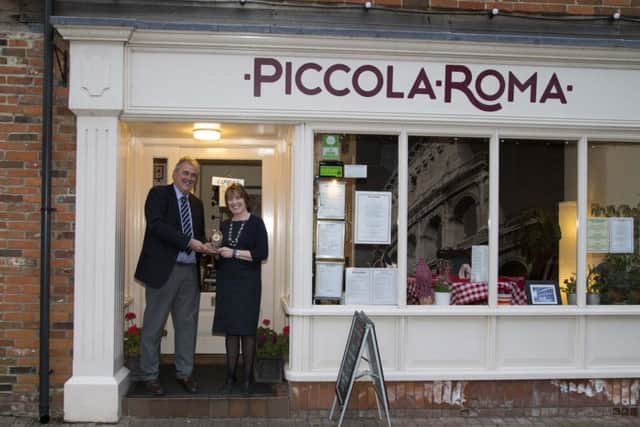 David Webb, the rural affairs and tourism policy chairman for the Federation of Small Businesses with Charlie Anzano of Piccola Roma of Bishop's Waltham