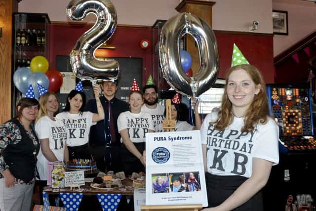 Staff at The Isambard Kingdom Brunel, in Guildhall Walk, Portsmouth, celebrate the pub's 20th anniversary