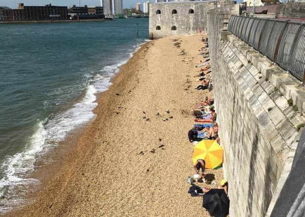 Alan Corrigan sent in this picture of sunbathers at the Hot Walls in Old Portsmouth today