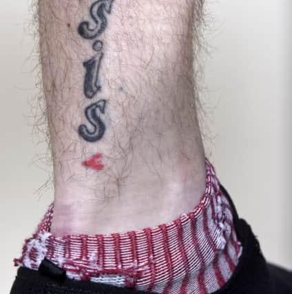 Callum Spragg's ISIS tattoo  
Picture: Simon Czapp/Solent News & Photo Agency 
UK