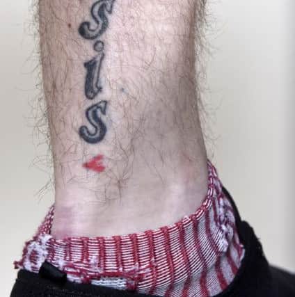 Callum Spragg's ISIS tattoo  
Picture: Simon Czapp/Solent News & Photo Agency 
UK