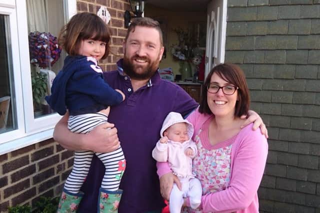 Gavin Moth, who has MS, his wife Kristin and their daughters Clara and baby Evie