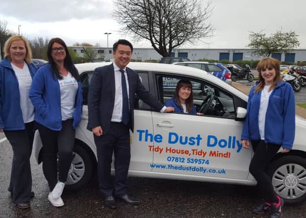 From left, Emma Marsh, Lynsey Lambourne, Alan Mak MP,  Kelly Edney in the drivers seat, and Gemma Colley from the Dust Dolly