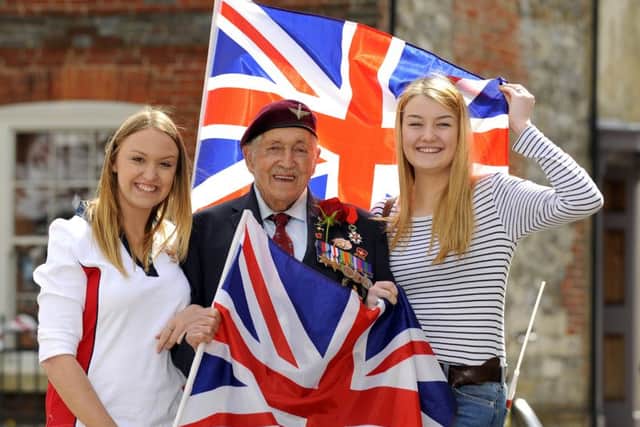 From left, Danielle Savage, 19, who works in The Ship Inn, with D-Day veteran Arthur Bailey from Cosham andwith Jessica Warren, 18, who works in The Bluebell Inn, both in EmsworthPicture: Malcolm Wells (160421-0699)