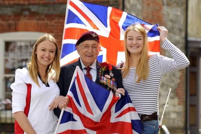 From left, Danielle Savage, 19, who works in The Ship Inn, with D-Day veteran Arthur Bailey from Cosham andwith Jessica Warren, 18, who works in The Bluebell Inn, both in Emsworth

Picture: Malcolm Wells (160421-0699)