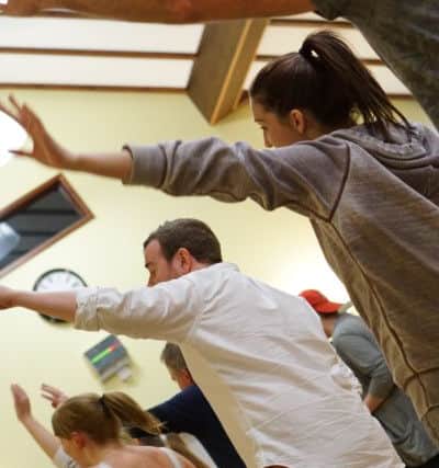 The cast of The Hot Mikado in rehearsal