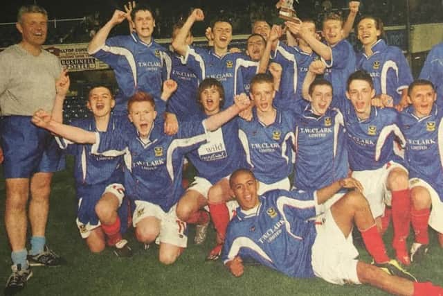 The Portsmouth Schools team celebrate winning the English Schools Football Associations Under-15 Inter Association Trophy in 2004 with team manager Graham Bryant, far left