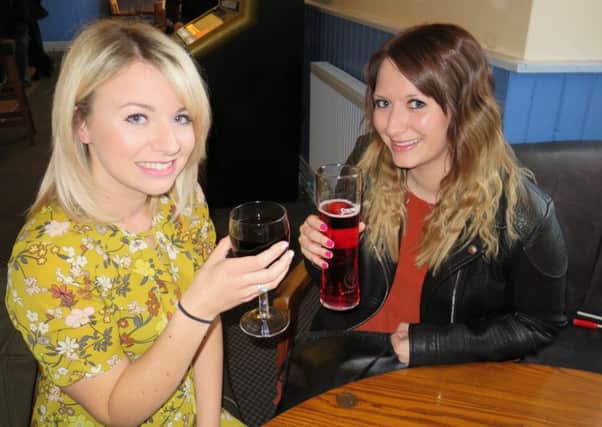 Sisters Hollie Edmonds, 25,  and Charlotte Edmonds, 27, at the Old House at Home pub in Locksway Road, Milton, Portsmouth
