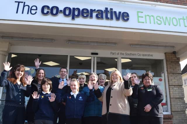 The Southern Co-operative store colleagues in Emsworth present St James Primary School and Emsworth Primary School with Â£15,000 donation for school improvements