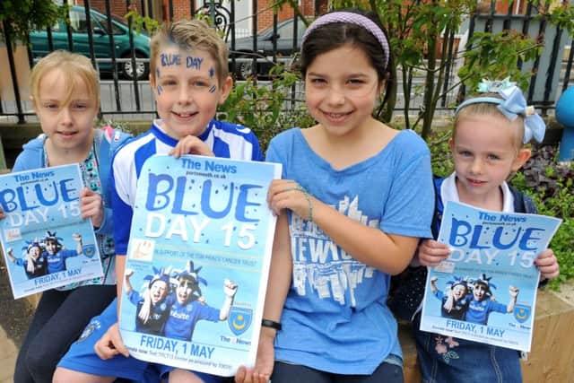 From left, Holly Whitley, Jack Richardson, Carrie Davies and Chloe Finch at Milton Park Primary School on last year's Blue Day