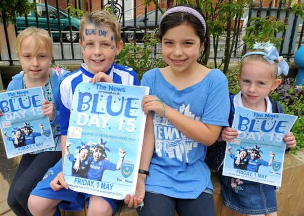 From left, Holly Whitley, Jack Richardson, Carrie Davies and Chloe Finch at Milton Park Primary School
 on last year's Blue Day