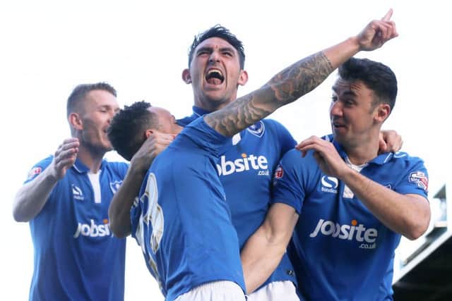 Pompey can effectively seal a play-off place with victory over Wycombe tomorrow    Picture: Joe Pepler