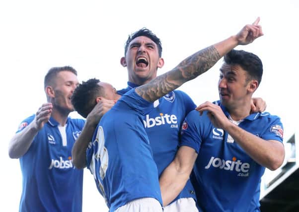 Pompey can effectively seal a play-off place with victory over Wycombe tomorrow    Picture: Joe Pepler