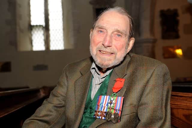 D-Day veteran George Higgins, 96, who has been presented with his British medals after a 69-year wait Picture: Sarah Standing (160638-4841)