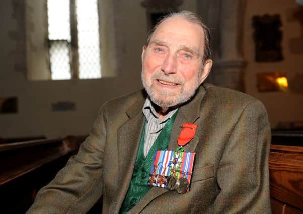 D-Day veteran George Higgins, 96, who has been presented with his British medals after a 69-year wait Picture: Sarah Standing (160638-4841)