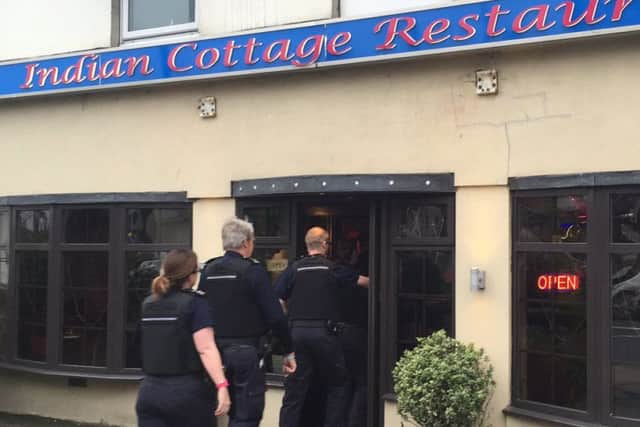 An immigration raid on the Indian Cottage curry house in West Street, Fareham on Friday Picture: Tom Cotterill