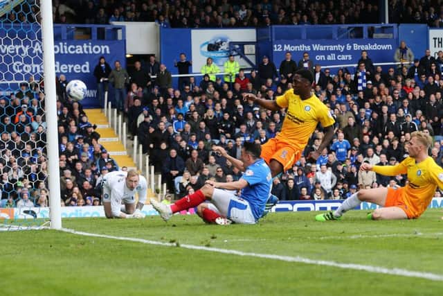 Gary Roberts scores the opener for Pompey in their 2-1 win over Wycombe    Picture: Joe Pepler