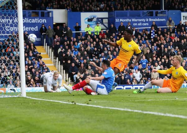 Gary Roberts scores the opener for Pompey in their 2-1 win over Wycombe    Picture: Joe Pepler