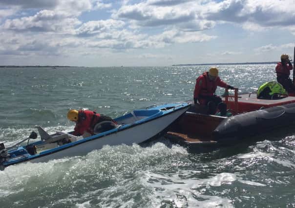 Rescuers plucked two people out of the water in the Solent today
Picture: James Baggott