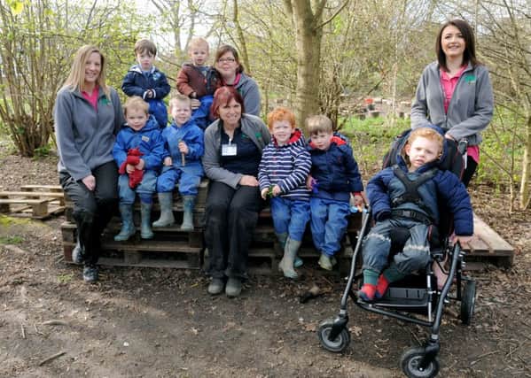 From left, Forest school leaders Dawn White and Sue Evans (at the front), with early years practitioners Hannah Mitchell (at the back) and Charlotte Rix and the some of the children

Picture: Sarah Standing (160602-)