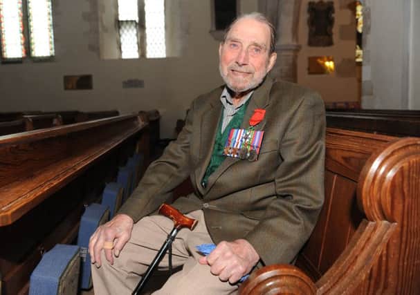 George Higgins, 96, was presented with his British medals for the first time last  Friday. 
Picture: Sarah Standing (160638-4829) PPP-160422-173706001