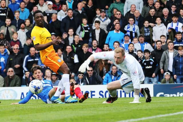 Conor Chaplin scores Pompey's second goal against Wycombe on Saturday Picture: Joe Pepler