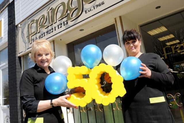 Fringe hair salon in Highfield Avenue, Waterlooville is celebrating their 50th Birthday. Owner Angela Andrews, left, and senior stylist Mandy Kinsella Picture: Sarah Standing (160619-3147)
