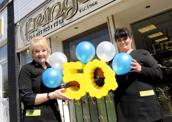 Fringe hair salon in Highfield Avenue, Waterlooville is celebrating their 50th Birthday. Owner Angela Andrews, left, and senior stylist Mandy Kinsella Picture: Sarah Standing (160619-3147)