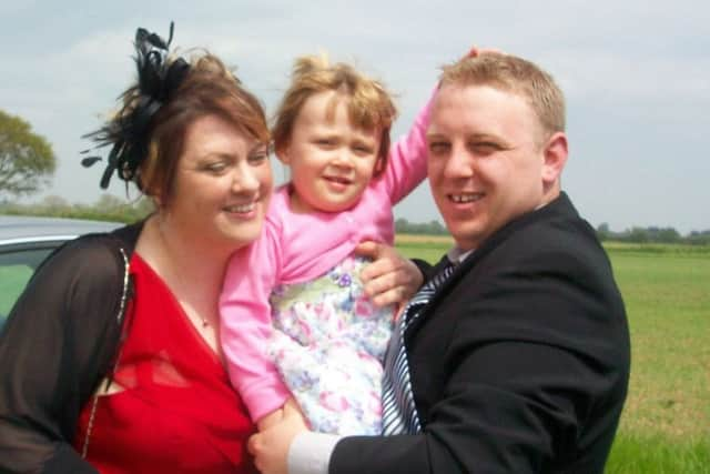 Ashley and Lisa Tong with daughter Amelia, who died in 2014 at the age of three