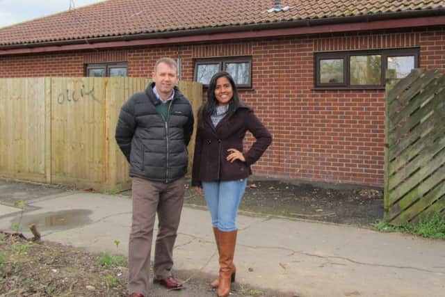 Iain Lucas, chief officer of the Rowner Community Trust, with volunteer Denisse Medina Rodrigeuz outside the Nimrod Centre, in Gosport, where the new entrance will be built as part of the regeneration work.
Picture: Ellie PIlmoor