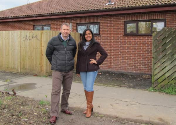 Iain Lucas, chief officer of the Rowner Community Trust, with volunteer Denisse Medina Rodrigeuz outside the Nimrod Centre, in Gosport, where the new entrance will be built as part of the regeneration work.
Picture: Ellie PIlmoor