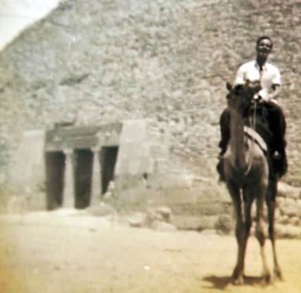 EAST ENDER Petty Officer Alan Walker alongside the Great Pyramid of Giza