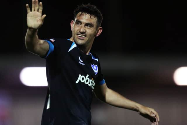 Gary Roberts acknowledges the travelling Pompey fans. Picture: Joe Pepler