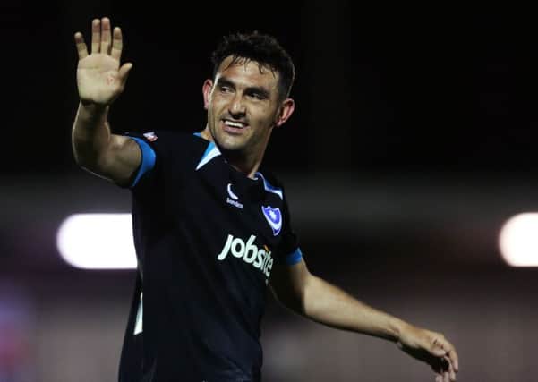Gary Roberts acknowledges the travelling Pompey fans. Picture: Joe Pepler