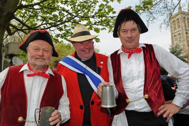 Ron Fidler, Father Bob White and David Shields at last year's May Fair. Picture: Ian Hargreaves  (150830-6)