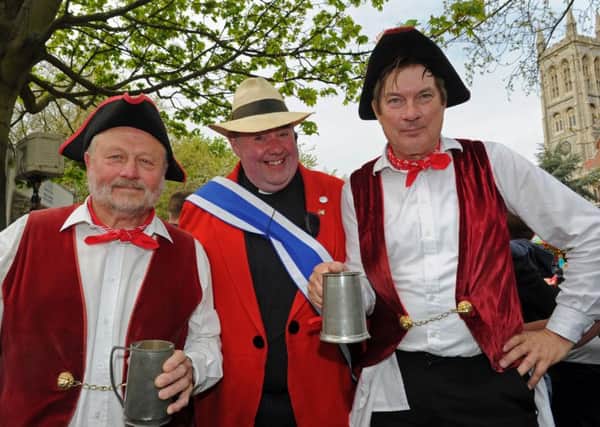 Ron Fidler, Father Bob White and David Shields at last year's May Fair. 
Picture: Ian Hargreaves  (150830-6)