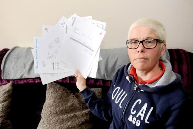 Stephanie Lee with her Vodafone bills